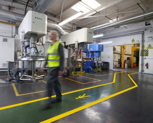 Man walking on warehouse line marking