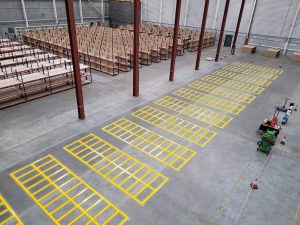 line painted shoebox area in a warehouse